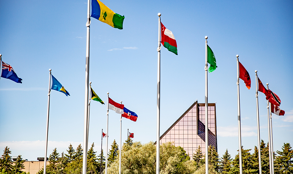 Photo of various flags outside the Winnipeg Mint. Photo of various flags outside the Winnipeg Mint.