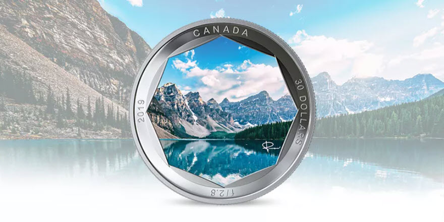 image The beauty of Moraine Lake, a glacially fed lake, is the first Canadian landscape to appear in a two-coin Peter McKinnon Photo Series by the Royal Canadian Mint. Each coin launching in 2019 is composed of 2-ounces of pure silver, has a $30 denomination, a 50-millimeter diameter, and gives the impression of looking through the aperture blades of a camera’s lens. Each coin is available individually or as a set by subscription, which includes a two-coin beauty box to showcase both coins in the series.