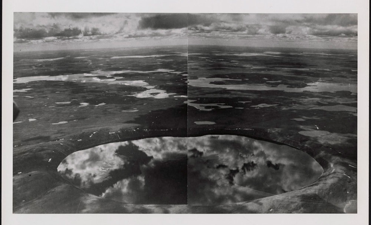 image Clouds reflecting off Pingualuit Crater Lake, aerial view