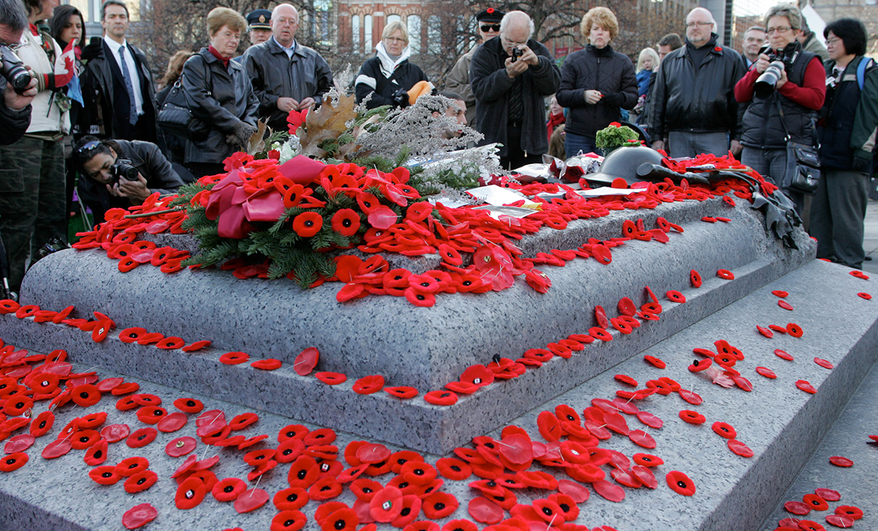 Tomb of the Unknown Soldier covered in poppies on Remembrance Day