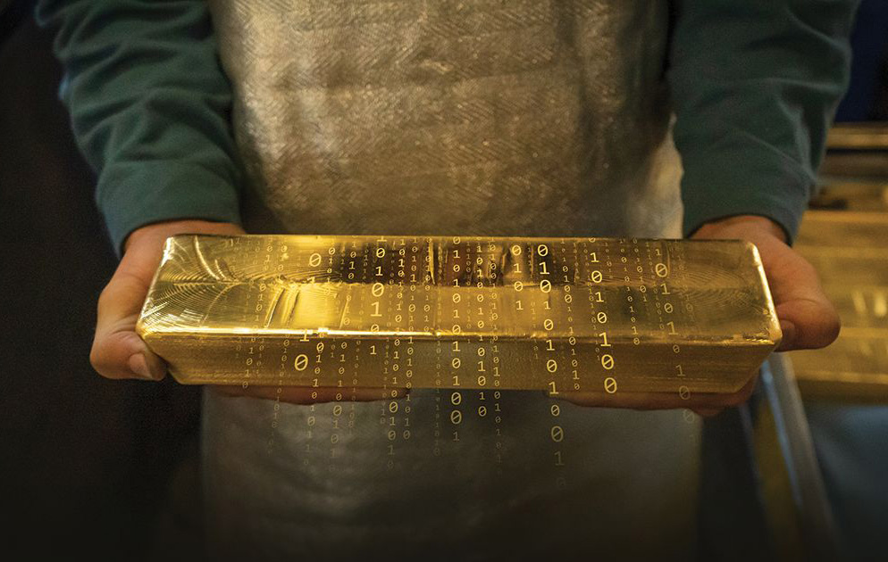 Person holding gold bar
